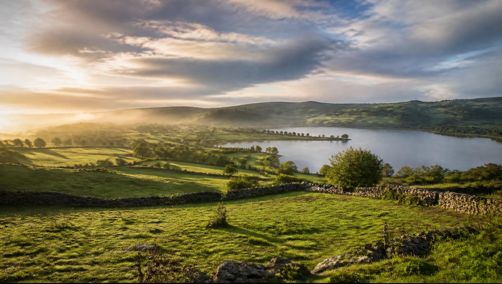 Green fields and a lake in County Cavan, Ireland